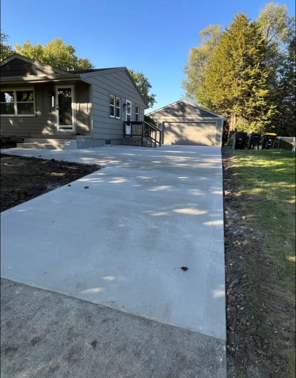 New concrete driveway leading to a detached garage, Medina Concrete, Des Moines