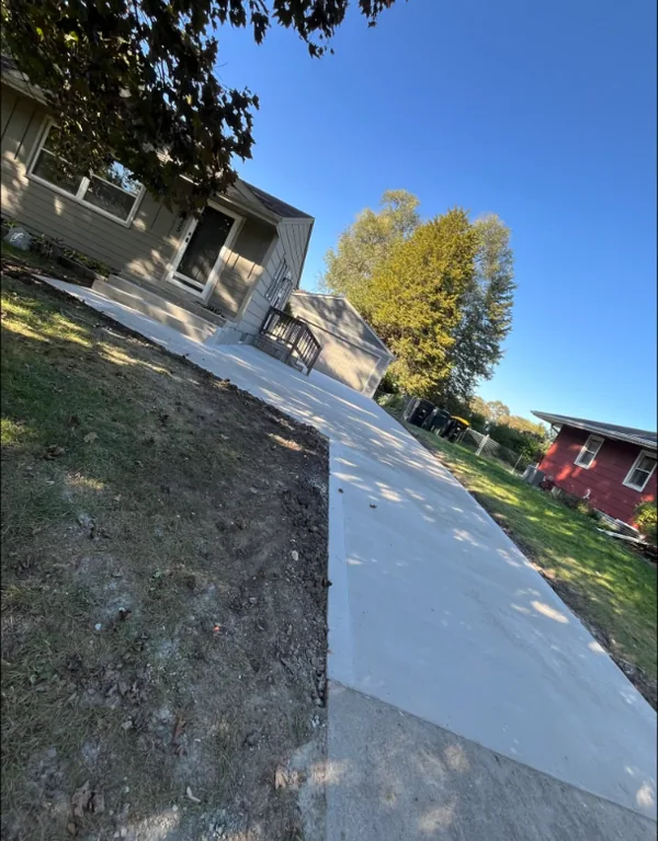 New concrete driveway seen from the house looking toward the street, Medina Concrete, Des Moines